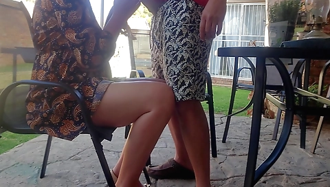 Amateur chick fucks her neighbor's wife in the backyard