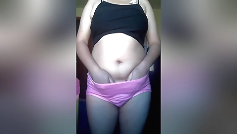 Busty brunette masturbates in her bedroom in amateur video