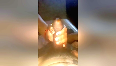 Indian babe getting a handjob on the bed in this vid