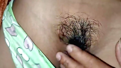 Indian girl in her dress is showing her hairy pussy