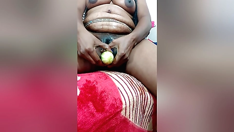 Solo indian girl masturbates in the bedroom with toy and cock