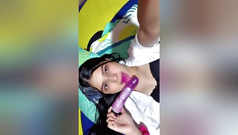 Horny brunette girl with beautiful long legs is showing off