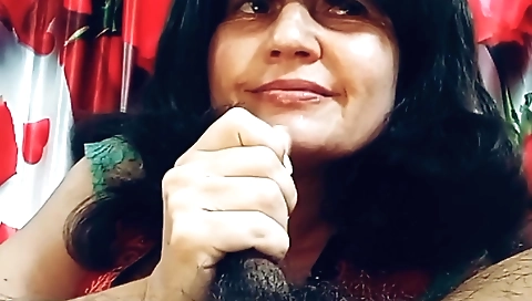 Busty mature milf sucks and fingered by a young guy