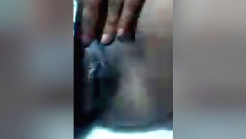 Indian girl rubs her pussy with a dick and touches it