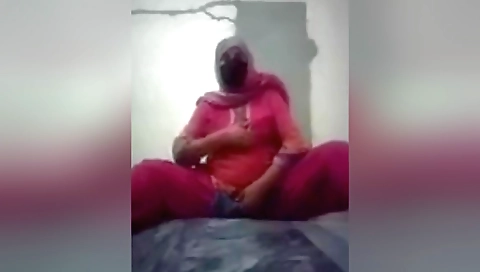 Sexy solo female with big tits and a sexy body is wearing a sexy dress