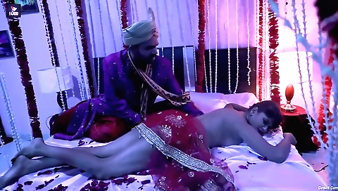 Bright and cute brunette on the bed in front of her camera