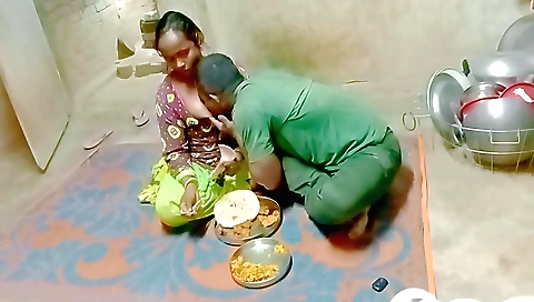 A girl with a nice face is giving a handjob to her friend