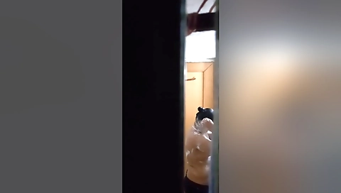 Bhabhi in the bathroom takes off clothes and masturbates