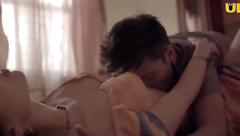 Busty brunette milf in sexy lingerie walks in the video