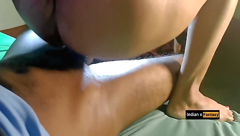 Indian girl riding her boyfriend's cock in a video