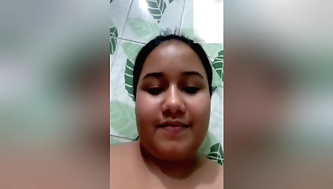 Busty brunette with big ass shows off her tits and ass