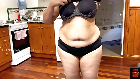 Amateur brunette shows off her tits and ass in front of the camera