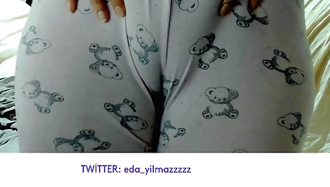 Sexy brunette milf enjoys her sexy feet while she plays with a dildo