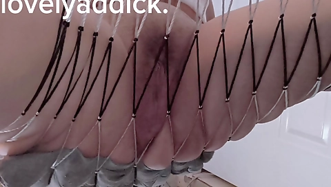 A naked girl wearing a sexy red dress in an amateur video