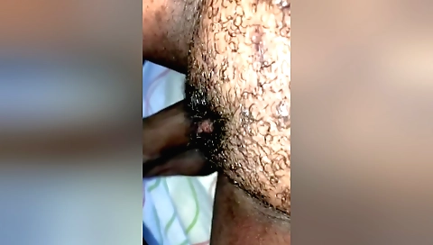 amateur hairy girl with a hairy pussy doing a blowjob