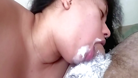 Indian girl with a big face and a mouth enjoys facial