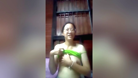 Sexy brunette in her indian home and masturbating solo