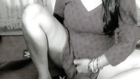 Horny wife fingers her big tits and masturbates in a solo video